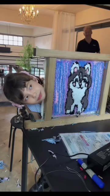 A young guest with a handmade rug